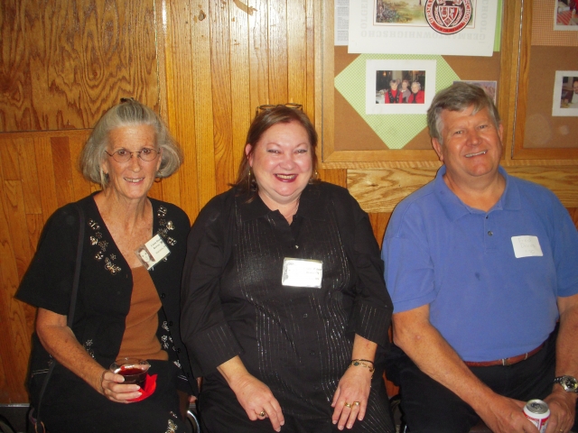 Linda Hook Reeves 70 and Ginny Wilson Drews 71 with Fred Drees 70 on Friday night.